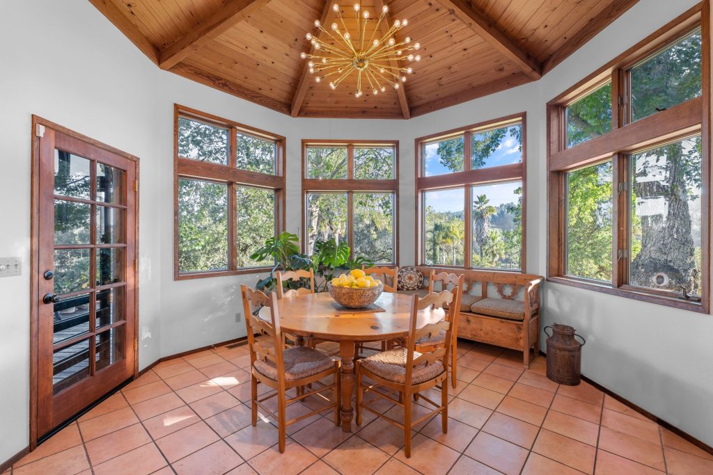 Bright dining room with large windows